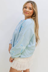 Beau Blue Sequined Bowknot Drop Shoulder Oversized Sweatshirt Sweatshirts & Hoodies JT's Designer Fashion