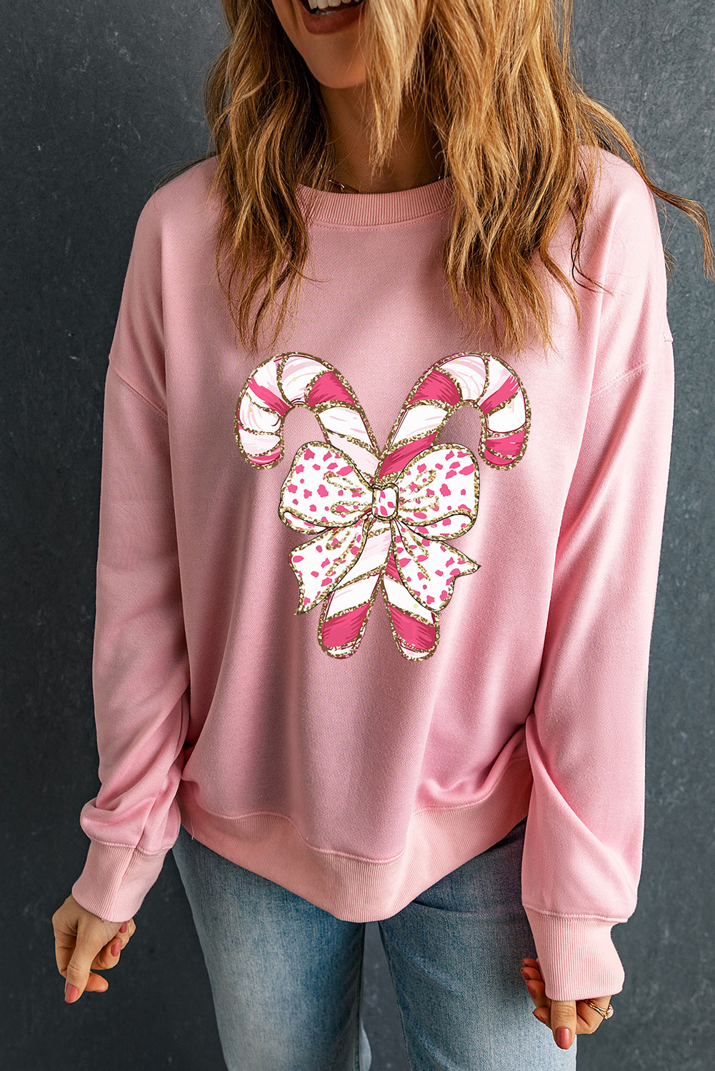 Pink Christmas Bow Candy Cane Graphic Drop Shoulder Crew Neck Sweatshirt Graphic Sweatshirts JT's Designer Fashion